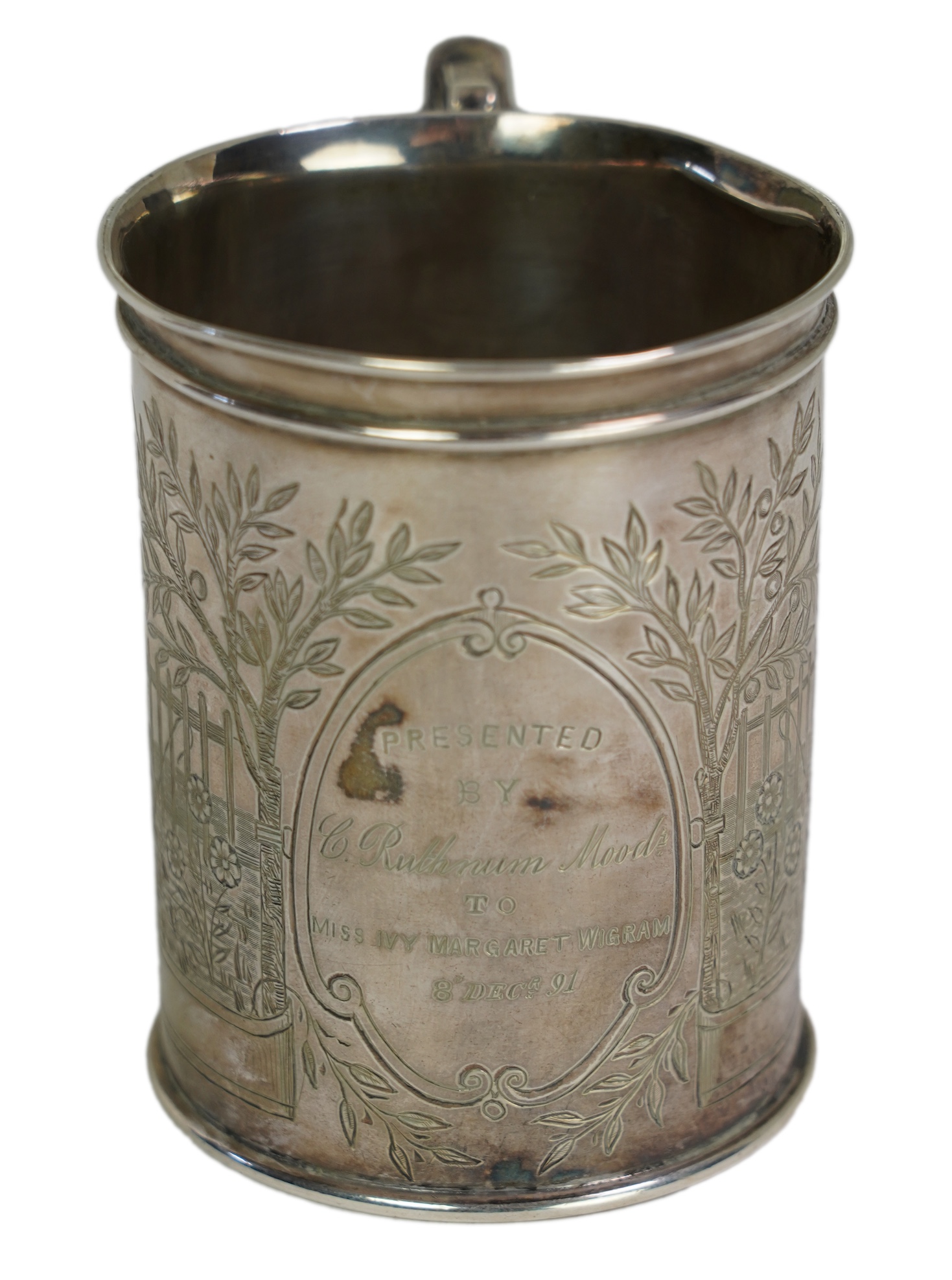 A 19th century Indian colonial white metal christening mug, by P. Orr & Sons, Madras